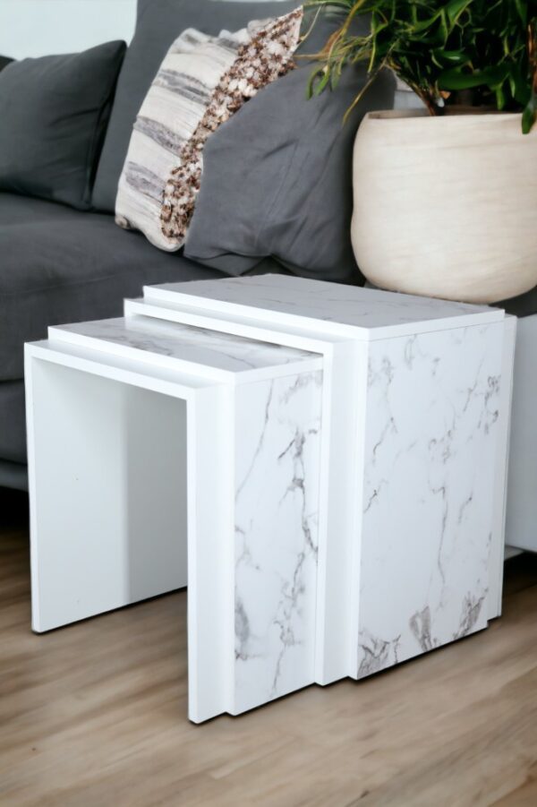 A set of service and side tables from Net Home, with a white design and wood alternative to marble